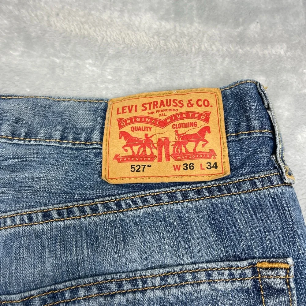 Levi's Jeans Mens 36x34 Blue Denim Whiskered Faded Stretch 527 Slim Bootcut Leg